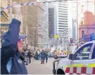  ?? Photo / AP ?? Streets in central Sydney were cordoned off after yesterday’s attack.