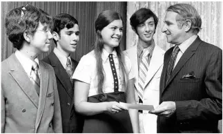  ??  ?? Two Ten president Henry Clayman with scholarshi­p recipients in 1971