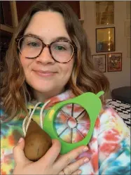  ?? MAERI FERGUSON ?? This photo shows Maeri Ferguson, 31, at home in Brooklyn on Jan. 26, 2021. While recovering from COVID-19, Ferguson’s sense of taste was re-awakened by pears. Whether it’s pears, kimchi, beets or broccoli, the pandemic has had a strange impact on food cravings that goes beyond the joy of comfort eating.