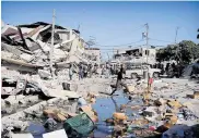  ??  ?? Casas totalmente destruidas luego del paso del terremoto en Puerto Príncipe.