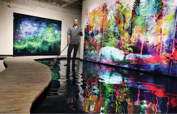  ?? ANDREW FRANCIS WALLACE PHOTOS/TORONTO STAR ?? Steve Driscoll in his west-end studio, complete with reflecting pool he installed for his show at Angell Gallery. On right, Shore, his eight-panel landscape that measures nine by 40 feet.