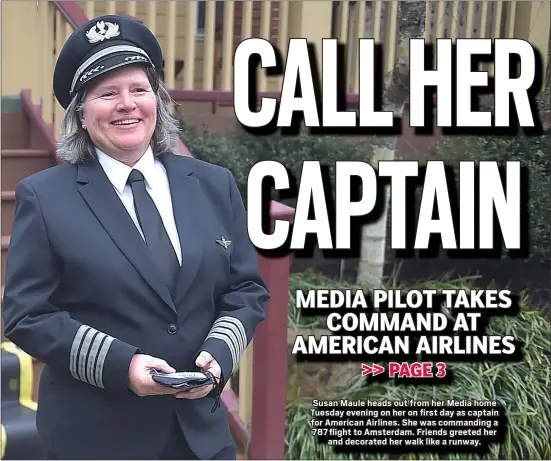  ?? PETE BANNAN - MEDIANEWS GROUP ?? Susan Maule heads out from her Media home Tuesday evening on her on first day as captain for American Airlines. She was commanding a 787 flight to Amsterdam. Friends greeted her
and decorated her walk like a runway.