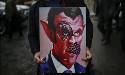  ??  ?? Protesters in Istanbul portray Emmanuel Macron as a devil on 30 October. Turkey’s president has questioned his mental health. Photograph: Emrah Gürel/AP