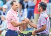  ??  ?? Sergio Garcia shakes hands with Shubhankar Sharma after defeating him at Austin Country Club, Texas.