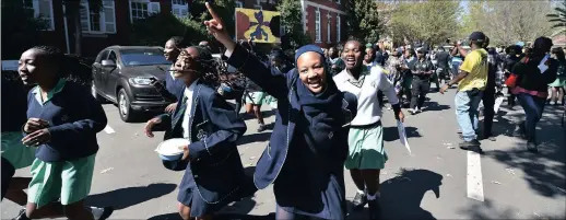  ?? PICTURE: PHILL MAGAKOE ?? RISING UP: PHSG girls protest this week while Gauteng Education MEC Panyaza Lesufi meets the school management after black pupils were allegedly told to straighten their naturally curly hair. Lesufi has warned other schools to eradicate similar bias...