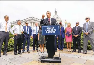  ?? ANDREW HARNIK AP FILE ?? Rep. Andy Biggs, R-Ariz., who was then the leader of the House Freedom Caucus, speaks at a news conference on July 29, 2021. Biggs is among the House Republican­s the Jan. 6 committee wants to interview.