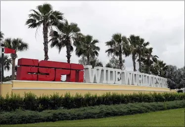  ?? JOHN RAOUX — THE ASSOCIATED PRESS ?? A sign marking the entrance to ESPN’s Wide World of Sports at Walt Disney World is seen June 3in Kissimmee, Fla.