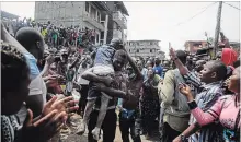  ?? SUNDAY ALAMBA THE ASSOCIATED PRESS ?? Scores of children were thought to be inside at the time of a building collapse in Nigeria.