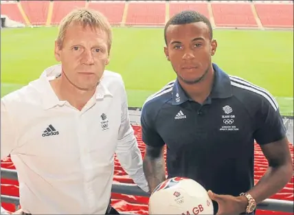  ?? Picture: PA. ?? Stuart Pearce with Ryan Bertrand at Wembley.