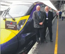 ??  ?? High Speed driver manager Kent Evenden and fleet engineerin­g manager Andy Harding with the poppy train which has raised more than £45,000