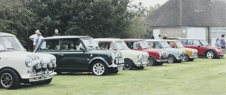  ??  ?? Mini line-up: classic Minis from different eras