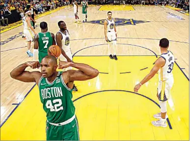  ?? PHOTOS BY JED JACOBSOHN / POOL PHOTOS VIA AP ?? Boston Celtics center Al Horford (42) celebrates after scoring against the Golden State Warriors during the second half of Game 1 of the NBA Finals in San Francisco on Thursday.