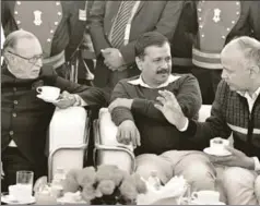  ?? HT ?? Arvind Kejriwal (centre) felt the mandate supported an expectatio­n for an unpreceden­ted shift in the process of governance, raising the hackles of the bureaucrat­s