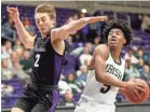  ?? COMMERCIAL APPEAL MAX GERSH/THE ?? Christian Brothers' Elijah Federman (2) tries to guard Knoxville Catholic's BJ Edwards (5) as he pushes to the basket on Friday in Nashville.