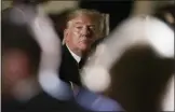  ?? ALEX BRANDON- THE ASSOCIATED PRESS ?? President Donald Trump listens to music by military musicians during a State Dinner in the Rose Garden at the White House, Friday.