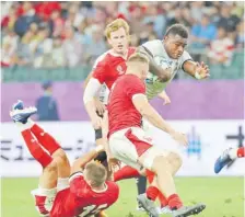  ?? Picture: JOVESA NAISUA ?? Flying Fijians wing Josua Tuisova breaks through the Welsh defence at the Oita Stadium in Japan.