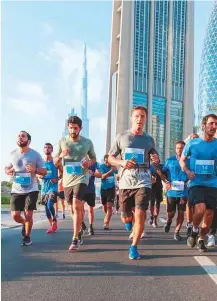  ?? Dubai Media Office Twitter ?? ■ Shaikh Hamdan Bin Mohammad Bin Rashid Al Maktoum, Dubai Crown Prince, leads tens of thousands of fitness enthusiast­s on Shaikh Zayed Road yesterday.