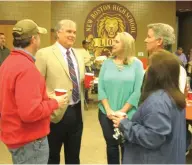  ?? Staff photo by Greg Bischof ?? ■ Fifth District Court Judge Bill Miller, Bowie County Court at Law Judge Jeff Addison, County Clerk Tina Petty, District Attorney Jerry Rochelle and County Treasurer Donna Burns talk Saturday during the county’s Meet the Candidates and Straw Poll event.