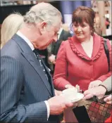  ??  ?? Annie Macdonald is hoping a new, lighter weight Harris tweed blend which she wore meeting HRH at the Waldorf Astoria in 2016 will be part of a brighter future for HTT Manufactur­ing.