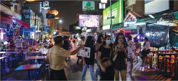  ?? BLOOMBERG ?? Khaosan Road in Bangkok. Thailand is eyeing plans for vaccine passports and quarantine waivers as the global Covid-19 inoculatio­n drive gathers pace