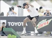  ?? CHARLIE NEIBERGALL — THE ASSOCIATED PRESS ?? Nyjah Huston acknowledg­es there is a certain pressure that comes with competing in the Tokyo Olympics.