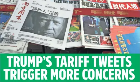  ?? NG HAN GUAN, AP ?? Donald Trump is hot news in China, which he has repeatedly criticized as having trade policies that hurt the U.S. economy. A new series of tweets Sunday threatenin­g a 35% tariff on U.S. companies shipping jobs abroad has left many trade experts baffled.
