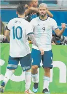  ?? Photo / AP ?? Sergio Aguero (right) celebrates his goal with Lionel Messi.