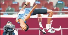  ?? ANI ?? Nishad Kumar on way to winning India’s second silver medal, in the T47 high jump event clearing 2.06m, at the Tokyo Paralympic­s on Sunday.