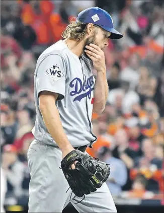  ?? Photograph­s by Wally Skalij Los Angeles Times ?? TRYING TO FIGURE THINGS OUT, Clayton Kershaw couldn’t hold a four-run lead and then a three-run lead in Game 5. “All of a sudden, he nibbled,” Astros bench coach Alex Cora said.