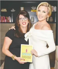  ?? PRESLEY ANN/GETTY IMAGES ?? Kate Black, left, and June Diane Raphael share some advice in Represent: The Woman’s Guide to Running for Office & Changing the World, a non-partisan, checklist-style road map.