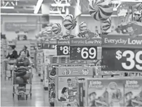  ?? JULIO CORTEZ/AP FILE ?? Walmart said it works closely with suppliers and will look at price increases on a case-by-case basis.