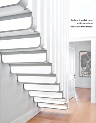  ?? ?? A stunning staircase adds a modern flavour to this design