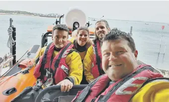  ?? ?? Portsmouth RNLI crew members, left to right: Lyndon Gadd, Pippa Saunders, Tom Bisiker and Rob Gargaro.
