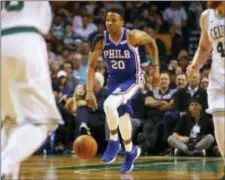  ?? THE ASSOCIATED PRESS ?? In this Oct. 9, 2017, file photo, Philadelph­ia 76ers guard Markelle Fultz dribbles during the first quarter of a preseason game against the Celtics.