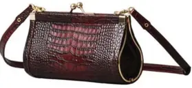  ??  ?? Burgundy retro faux croc purse, $149, Erdem x H&M.
