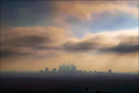  ??  ?? Downtown Los Angeles is shrouded in early morning coastal fog Aug. 12. AP PHOTO