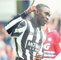  ??  ?? Andy Cole celebrates one of his many goals for Newcastle United.