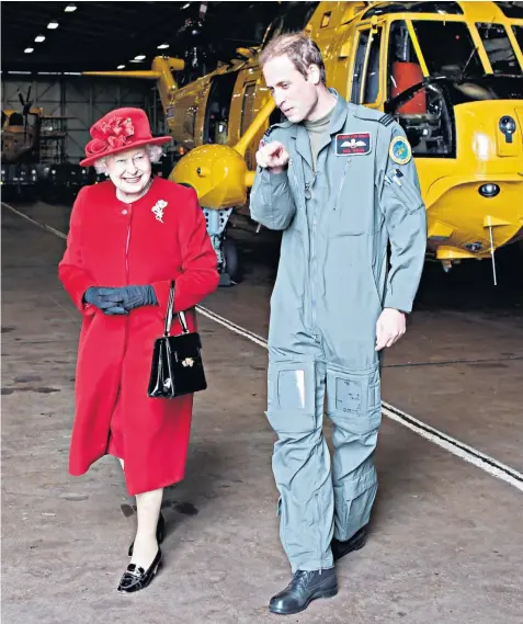  ?? ?? Prince William with the late Queen. He is as committed to a life of service as his grandmothe­r, but is not expected to take on many of the Kings duties