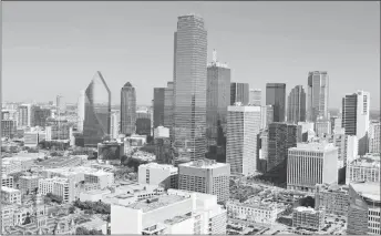  ??  ?? The view of the Dallas skyline from atop Reunion Tower.