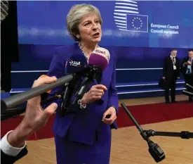  ?? FOTO: TT-AP/JOHN THYS ?? Storbritan­niens premiärmin­ister Theresa May under en presskonfe­rens i Bryssel i går.