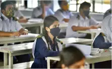  ?? File/AFP ?? Students attend their class at the Rajuk Uttara Model College in Dhaka.