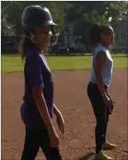  ?? COURTESY — SARAH HALL ?? Base runner Danalyse Rivera, left, and fielder Jazlyn Miller.