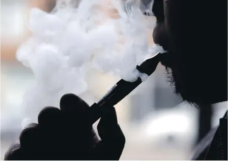  ?? AP ?? While the proportion of Canadians who smoke tobacco continues to decline — it’s now about 18 per cent — the survey suggests the prevalence of vaping is on the rise. Last month’s survey found 18 per cent of respondent­s had tried vaping, up from 8.5 per cent in 2013.