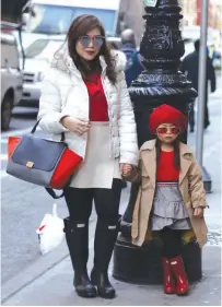  ??  ?? Mommy Clarisse and Elle pose with matchy outfits in New York