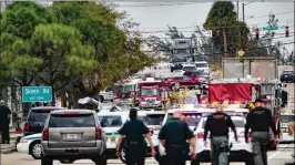  ?? MELANIE BELL / THE PALM BEACH POST ?? Officials said people in one car shooting at another car appear to have led to Monday’s crash that closed Belvedere Road from Jog Road to Sansbury’s Way.