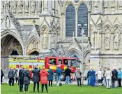  ??  ?? Emergency services were called to Salisbury Cathedral, left, after an attempted smash-and-grab on Magna Carta. The raider punched three holes in the display cabinet, right, using a hammer