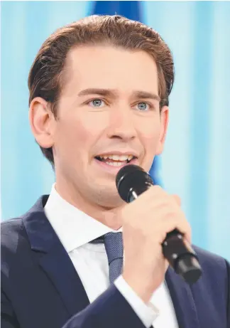  ?? Picture: GETTY ?? Austria’s new chancellor Sebastian Kurz addresses supporters after his conservati­ve People’s Party claimed victory in the nation’s election.