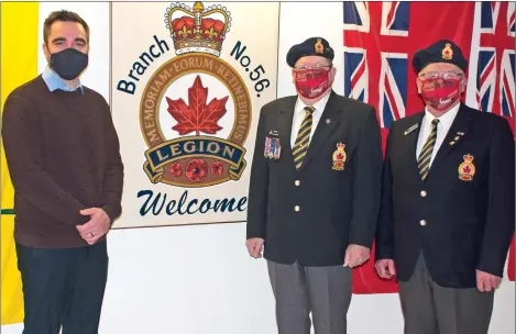  ?? SCOTT ANDERSON/SOUTHWEST BOOSTER ?? Cypress Hills Grasslands MP Jeremy Patzer recently met with Royal Canadian Legion Branch #56 Past President Jim Pratt and Vice President Rodger Ruf to unveil $15,605 in COVID-19 financial assistance to the local Legion from the federal government.