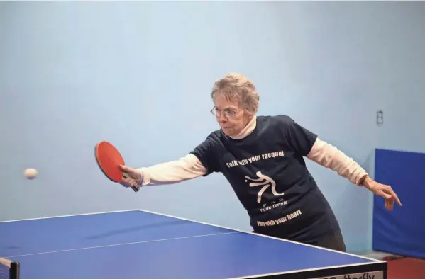  ?? PHOTOS BY NICOLAS GALINDO/COLUMBUS DISPATCH ?? Anne Fish, who has been with the club since the late 1950s, plays a game last week.