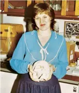  ??  ?? Pauline at work holding a skull in 1983